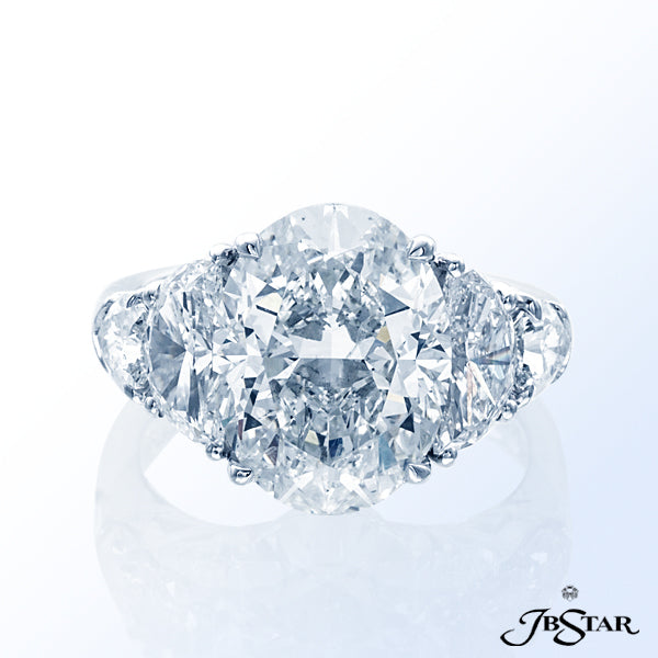 JB STAR EXQUISITE DIAMOND ENGAGEMENT RING FEATURING A STUNNING OVAL 5.67 CT DIAMOND EMBRACED BY HALF