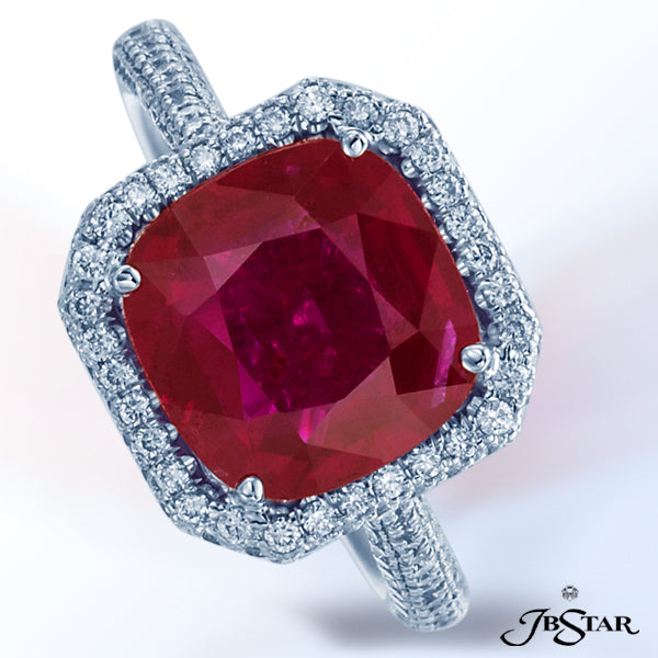 JB STAR A VIVID 4.06 CT CUSHION-CUT RUBY FROM MOZAMBIQUE IS DISPLAYED WITH A SPARKLING SHOW OF .80 C