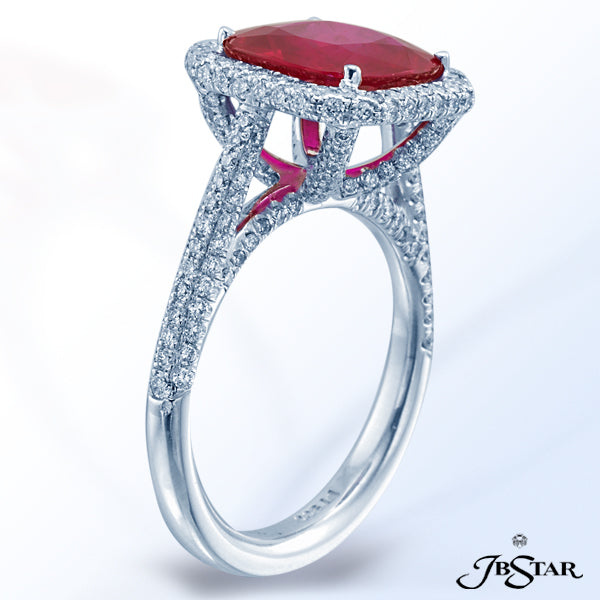 JB STAR A VIVID 4.06 CT CUSHION-CUT RUBY FROM MOZAMBIQUE IS DISPLAYED WITH A SPARKLING SHOW OF .80 C