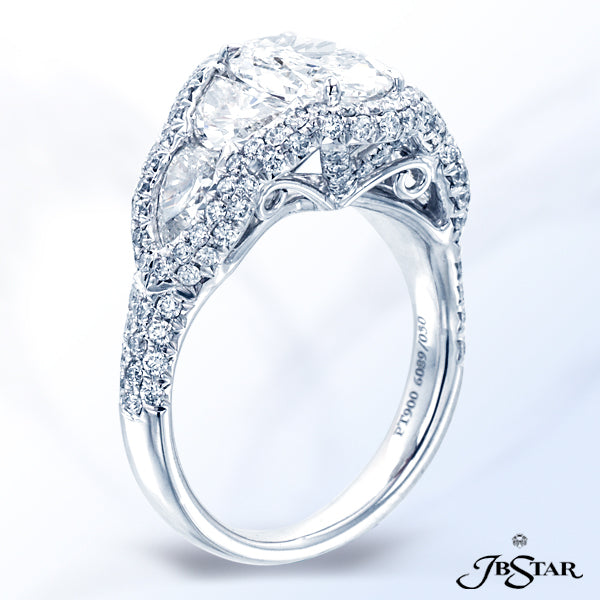 JB STAR PLATINUM DIAMOND RING FEATURING A BEAUTIFUL 1.52CT OVAL DIAMOND IN A MICRO PAVE SETTING AND