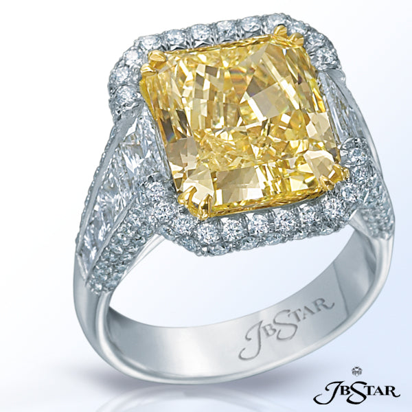 JB STAR THIS EXQUISITE FANCY YELLOW AND DIAMOND ENGAGEMENT RING IS HANDCRAFTED IN PLATINUM AND 18K Y