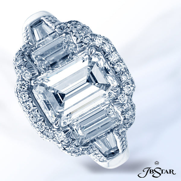 JB STAR DIAMOND ENGAGEMENT RING FEATURING A LOVELY 2.03 CT EMERALD-CUT DIAMOND EMBRACED BY ADDITIONA