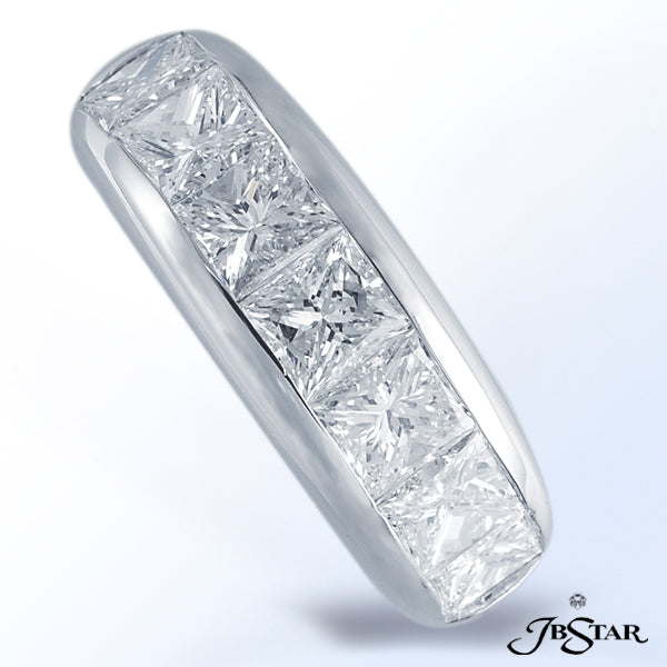 JB STAR MEN'S PLATINUM DIAMOND BAND WITH 7 PERFECTLY MATCHED PRINCESS DIAMONDS IN CHANNEL SETTING.