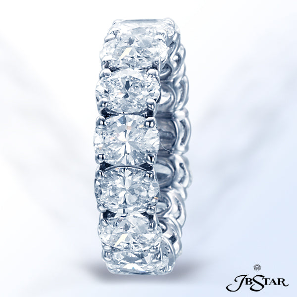 JB STAR PLATINUM DIAMOND ETERNITY BAND WITH 15 HAND-SET OVAL DIAMONDS IN A SHARED PRONG SETTING.DI