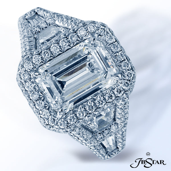 JB STAR DIAMOND ENGAGEMENT RING FEATURING A DAZZLING 2.20 CT EMERALD-CUT DIAMOND EMBRACED BY TRAPEZO