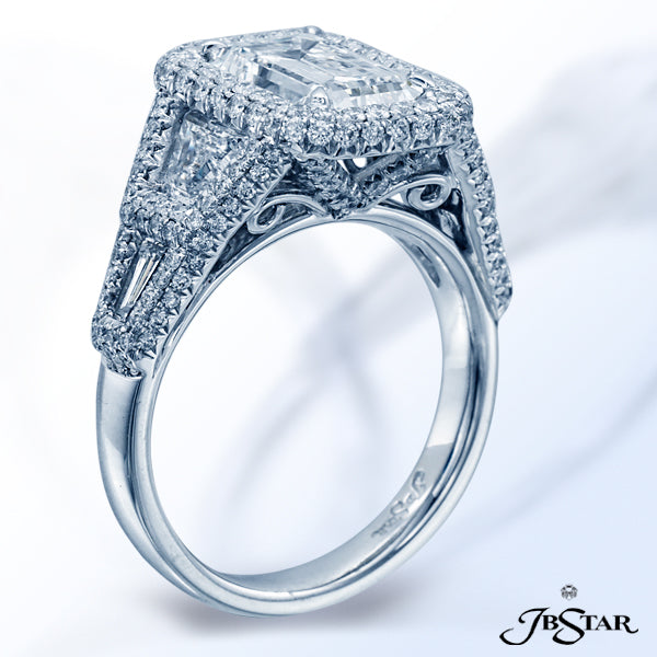 JB STAR DIAMOND ENGAGEMENT RING FEATURING A DAZZLING 2.20 CT EMERALD-CUT DIAMOND EMBRACED BY TRAPEZO