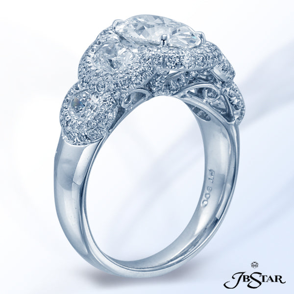 JB STAR STUNNING DIAMOND RING FEATURING A BEAUTIFUL 2.05 CT OVAL DIAMOND EMBRACED BY ADDITIONAL OVAL