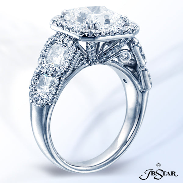 JB STAR PLATINUM DIAMOND RING FEATURING A GORGEOUS 3.11 CT RADIANT DIAMOND IN A MICRO PAVE HALO SETT