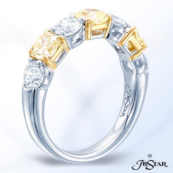 JB STAR MAGNIFICENTLY DESIGNED THIS PLATINUM AND 18K YELLOW GOLD BAND FEATURE ALTERNATING FANCY YELL