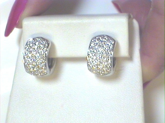 Classic huggie earrings that dazzle with rows of micro pave-set diamonds.  14K White gold, 1.80 total weight diamonds.