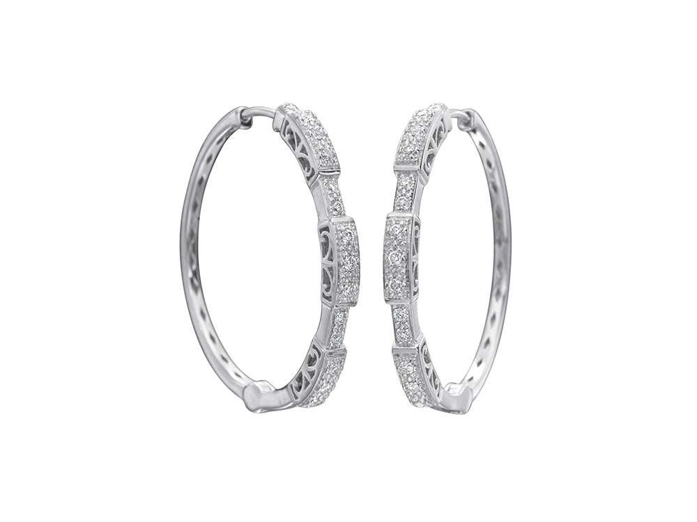 Alor 18 karat white gold and diamonds 0.24 total carat weight. Imported.