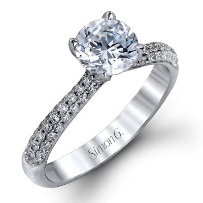 the classic design of this white gold engagement ring and wedding band set is emphasized by .72 ctw round cut white diamonds. (CENTER STONE PURCHASE SEPARATELY)